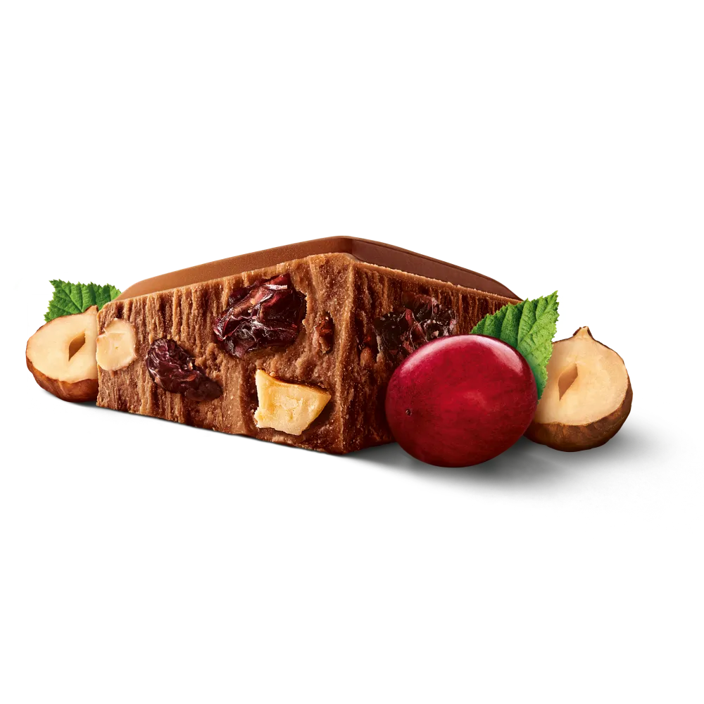 Ein Stück von der Milka Mmmax Schokolade der Sorte Traube Nuss